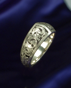 Peak top, hand engraved gold scroll ring