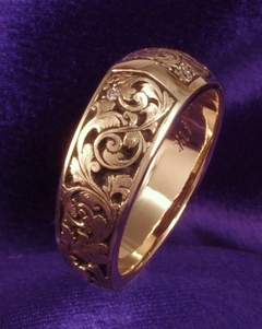 Hand engraved gold scroll ring