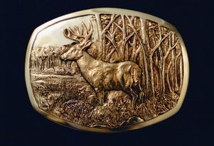 Hand engraved deer belt buckle in sterling silver