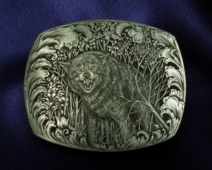 Hand engraved wolf buckle, Winter Kill